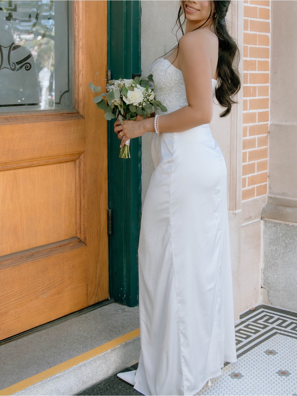 Elegant White Strapless Bridal Gown with Beaded Bodice